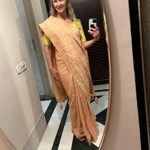 Peach Saree with yellow/gold blouse